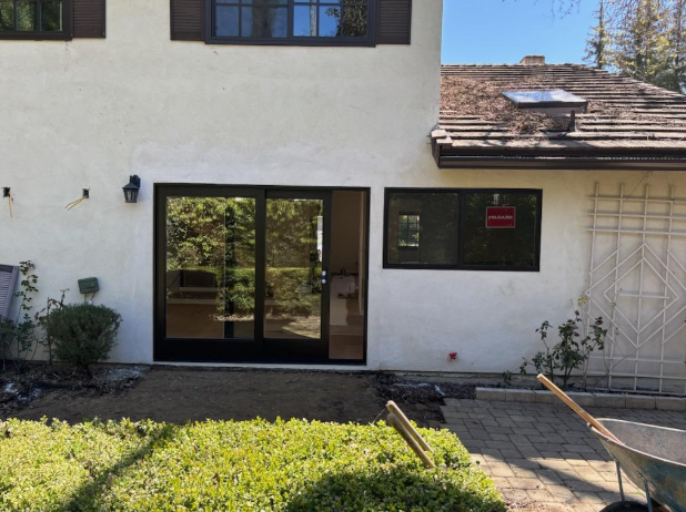 Energy-efficient window replacement installed in a home designed for changing climates